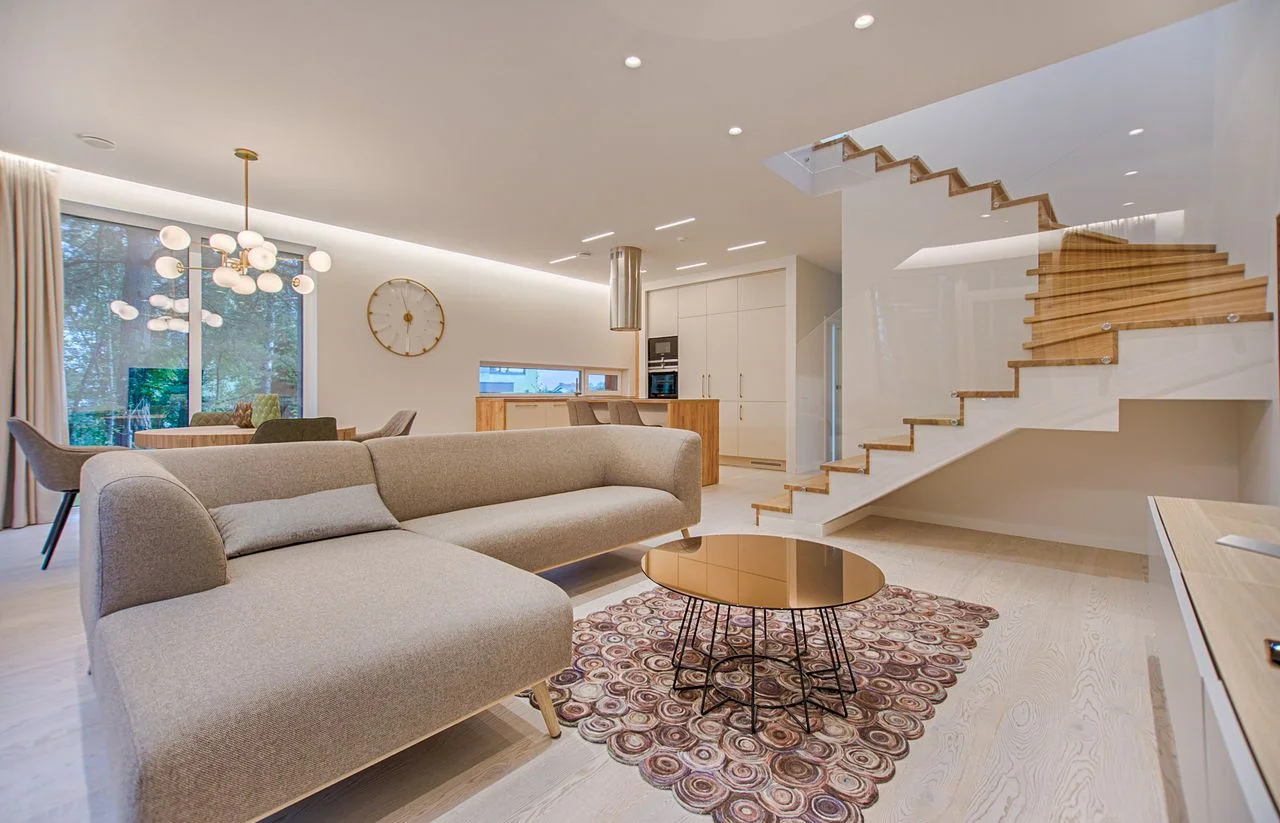 Modern duplex apartment design with an internal staircase and double-height living space